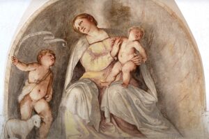 Visita guidata - Abbazia olivetana di San Nicola Fotografia dell'affresco con Madonna, Bambino e San Giovannino, dipinto da Romanino nel refettorio della foresteria dell'abbazia olivetana di San Nicola a Rodengo Saiano in Franciacorta